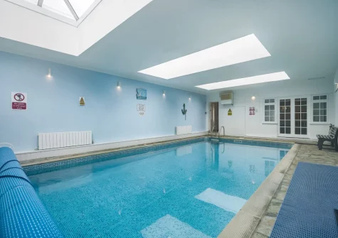 The indoor heated swimming pool at Tumbles Lodge, Hersham