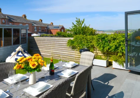 The patio, alfresco dining area & garden at Turnstone Cottage, Padstow