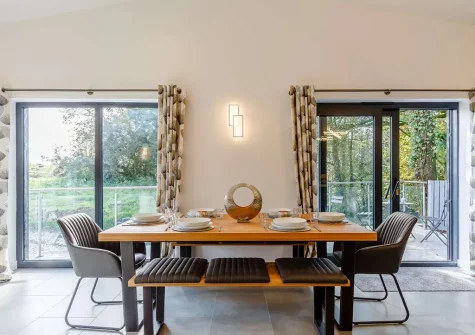 The dining area at Two Bees Barn, Bridgerule