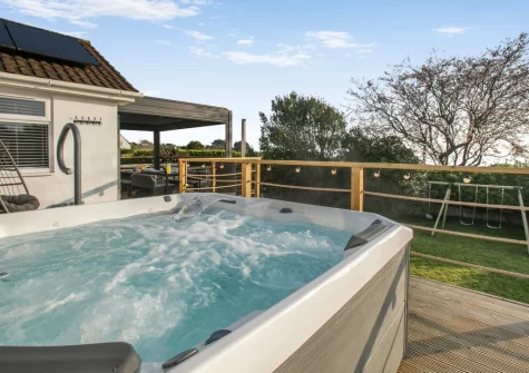 The decked terrace & hot tub at Two-Ways, Praa Sands