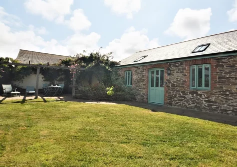 The patio, alfresco dining area & garden at Two Whitawoo, St Eval