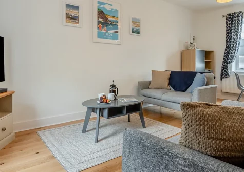 Upper Deck, Bude is a sleek two-bedroom apartment in vibrant Bude, perfectly positioned for beach lovers. With golden sands and coastal paths on your doorstep, enjoy contemporary comfort and seaside charm perfect for unforgettable family holidays.