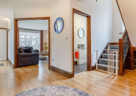 The hallway & stairs up to the first floor at Valentia, Bude