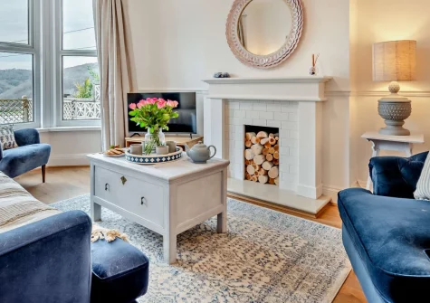 Valerian, Looe is a characterful Victorian home perched above the Looe Estuary, featuring stunning river views from a sunny decking area, elegant period interiors, and the dramatic South West Coast Path less than 500 metres from your door.