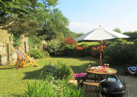 The patio, barbecue, alfresco dining area & enclosed private garden at Valley View, Woodford