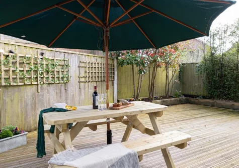 The decked patio & alfresco dining area at Vickery's Cottage, Woodbury