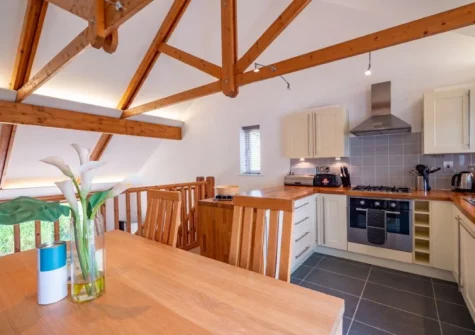 The kitchen & dining area at Villa Gallery 18 at The Valley, Carnon Downs