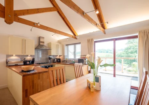 The kitchen & dining area at Villa Gallery 18 at The Valley, Carnon Downs