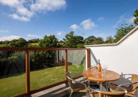 The balcony & alfresco dining area at Villa Gallery 18 at The Valley, Carnon Downs