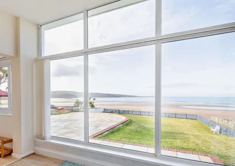 Enjoyt panoramic sea views from the living room at Villa Surfside, Phillack