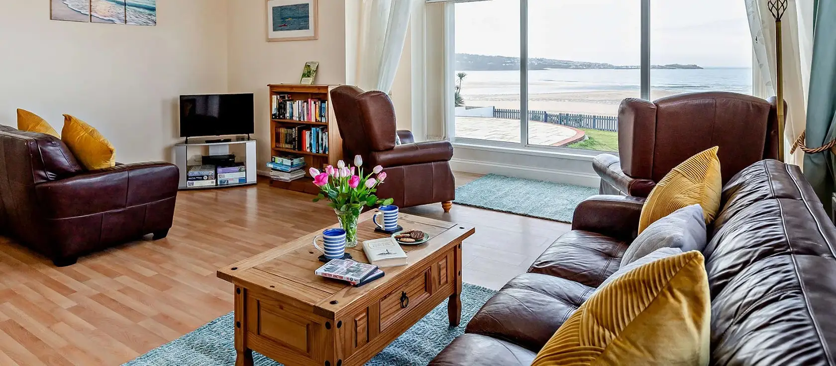 Villa Surfside, Phillack is a stunning clifftop retreat with breathtaking panoramic bay views. Enjoy direct beach access, coastal path walks, and exploring Cornwall's rich heritage and attractions. Perfect for families seeking seaside magic.