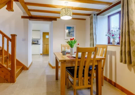 The dining area at Vines Cottage, Edistone