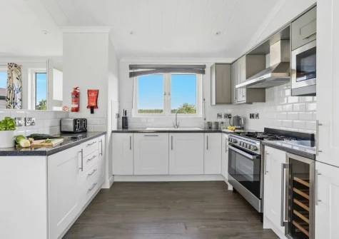 The kitchen at Violet Lodge, 11 Roadford Lake Lodges, Broadwoodwidger