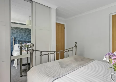 Bedroom #1 at Violet Lodge, 11 Roadford Lake Lodges, Broadwoodwidger