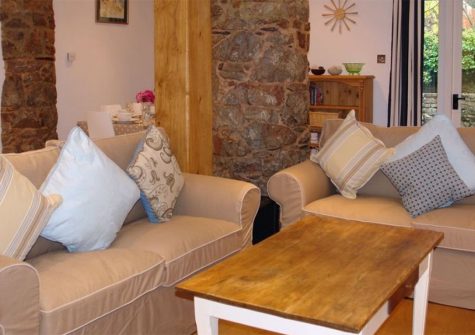 Wassail Cottage, Yalberton is a delightful three bedroom two bathroom cottage in a former cider barn. Modern open-plan living spills out onto the patio throughout bi-fold doors. The modern kitchen & dining area make this a comfortable place to relax.