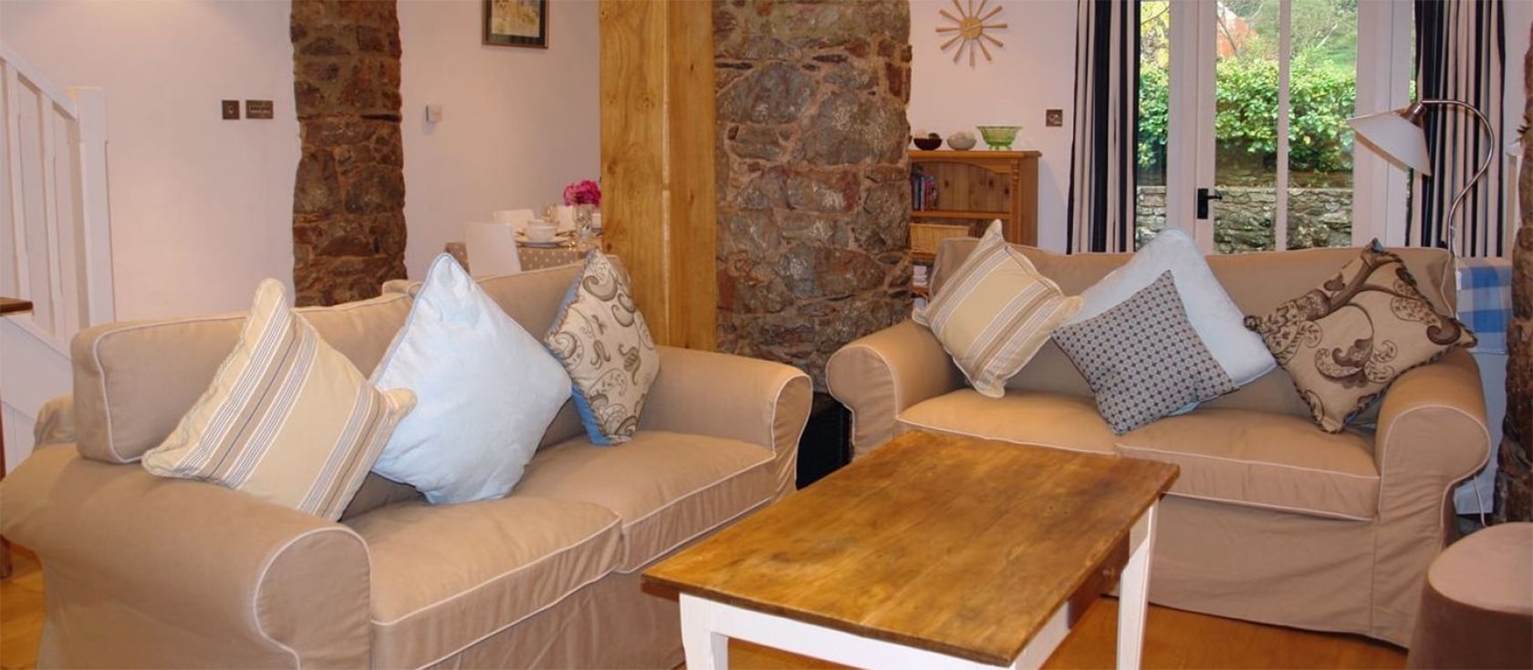Wassail Cottage, Yalberton is a delightful three bedroom two bathroom cottage in a former cider barn. Modern open-plan living spills out onto the patio throughout bi-fold doors. The modern kitchen & dining area make this a comfortable place to relax.