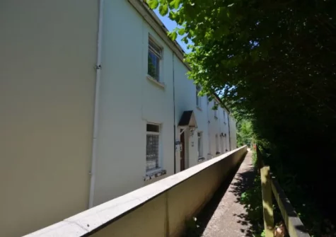 Water Terrace is a charming cottage with original exposed wooden beams, a lawned garden plus parking for two cars