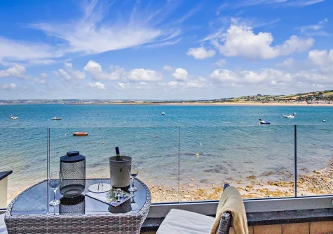 The balcony & outdoor sitting area at Waterfront House, Appledore