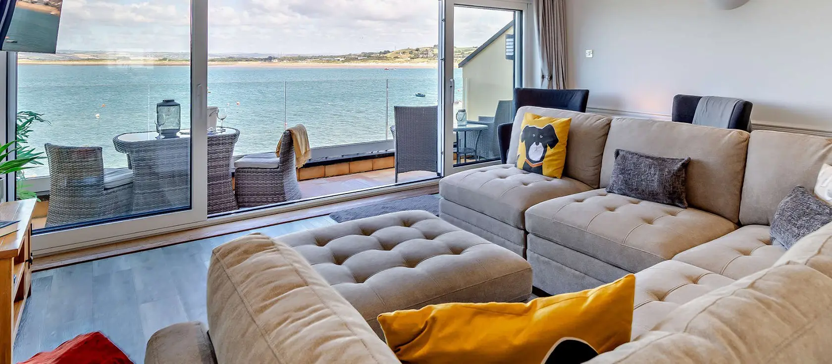 Waterfront House, Appledore is an elegant three-bedroom riverside haven with two private balconies overlooking the water. Featuring a stylish open-plan living space, wood burner, and luxury kitchen, it's ideally located for exploring North Devon.