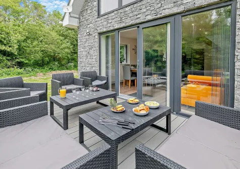 The patio & alfresco dining area at Watergate, Mawgan Porth