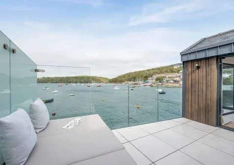 The patio & outdoor sitting area at Waters Edge, Polruan