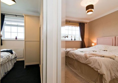 Bedroom #3 is adjacent to bedroom #1 @ Waters Edge
