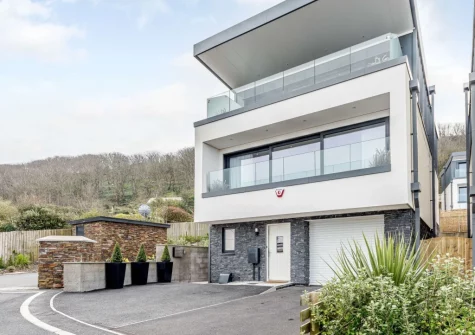 Waters Reach is a stunning five-star property with superb sea views, stylish interior &private in-house cinema