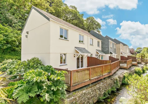 A gentle stream runs alongside the terrace & outdoor sitting area