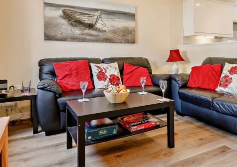 Waterside at Pendra Loweth, Falmouth is a modern three-bedroom cottage set within 16 acres of beautiful gardens, featuring a peaceful streamside terrace, excellent on-site leisure facilities, and easy walking access to Swanpool and Maenporth beaches.