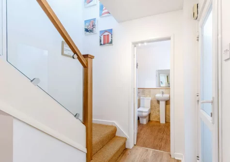 The entrance & stairs to first floor at Waves End, Babbacombe