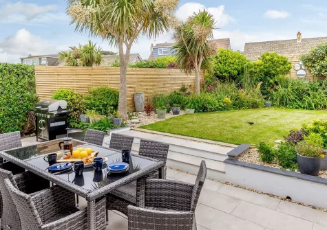 The patio. barbecue, alfresco dining area & garden at Wayfarer, Newquay
