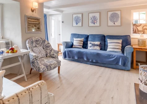 Well Too, Helford is a characterful three-bedroom cottage in the heart of this peaceful riverside village, featuring its own slipway, elevated terraces with stunning creek views, and direct access to waterside walks and coastal exploration.