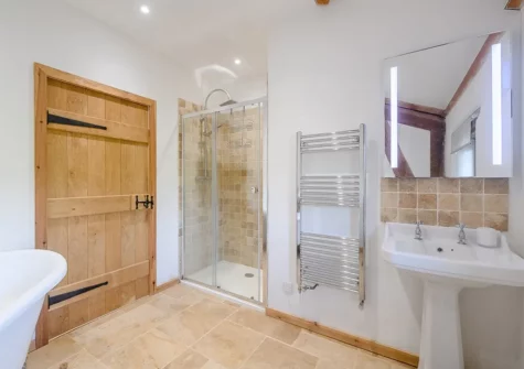 Bedroom #1 en-suite at West Farleigh Barn, Cadeleigh