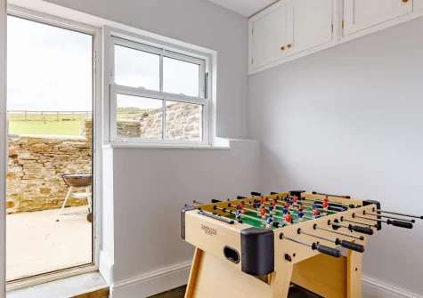 Step out onto the patio, with barbecue & alfresco dining area, at West Park, Herodsfoot