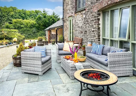 The patio & outdoor sitting area at West Pennicknold Barn, Shebbear
