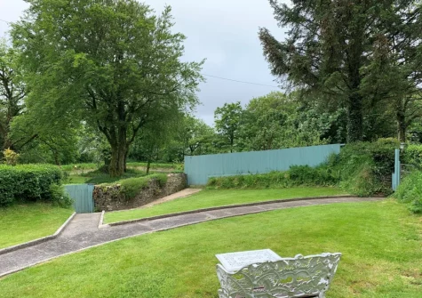 The lawned garden at West Wonford House, Milton Damerel