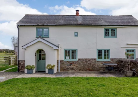 The patio, outdoor sitting area & garden at West Yard Cottage, Ashreigney