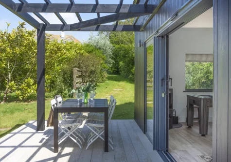The poolhouse patio & alfresco dining area at Westaway House, Trelights