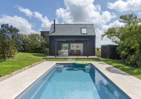 The outdoor swimming pool & poolhouse at Westaway House, Trelights