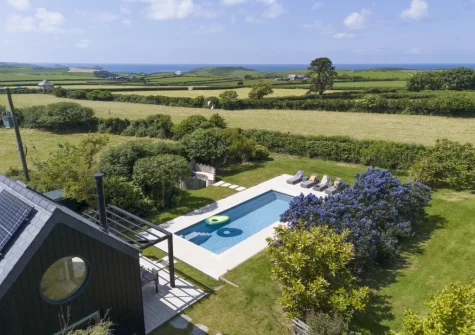 The poolhouse & outdoor swimming pool at Westaway House, Trelights