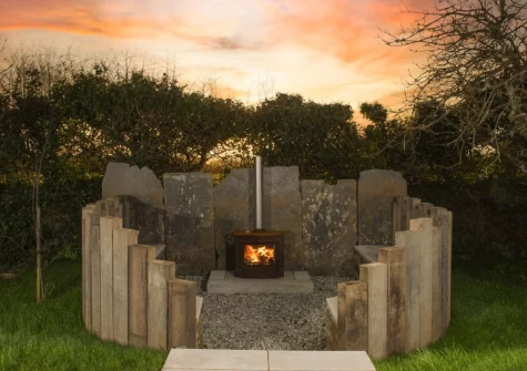 The outdoor wood-burning stove & sitting area at Westaway House, Trelights