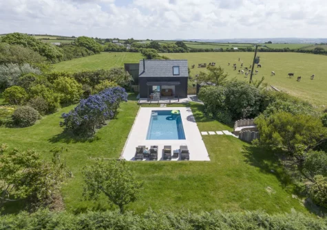 The poolhouse & swimming pool is nesteled at the bottom of the large beautiful & tranquil garden