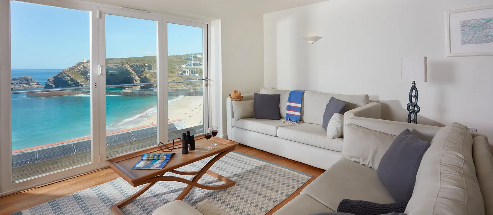 Westaway, Portreath is a luxurious four-storey beach house with fantastic sea views from almost every room. This property has four sea-facing bedrooms, an ultra-modern living space, and a wrap-around terrace with panoramic views and a hot tub.