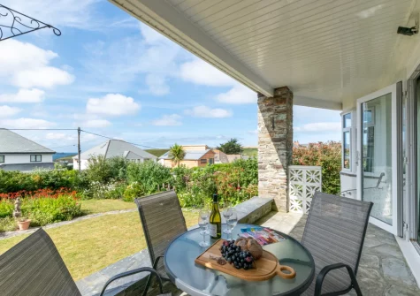 The covered Cornish slate terrace & outdoor sitting area at Westhaven, Trevone