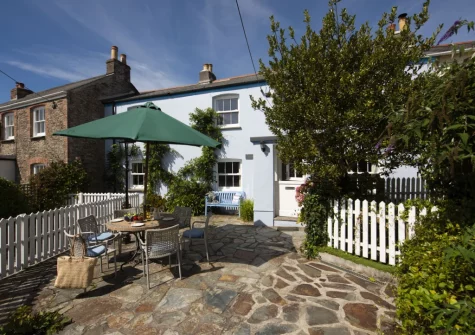 The enclosed patio, barbecue & alfresco dining area at Westover Cottage, St Mawes