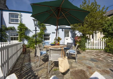 The enclosed patio, barbecue & alfresco dining area at Westover Cottage, St Mawes