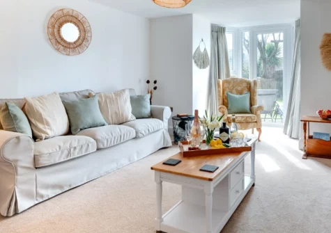 Westover House, Croyde is a characterful three-bedroom coastal retreat just 300 metres from Croyde Beach, featuring a sunny south-facing garden with sea views, charming farmhouse interiors, and direct access to the South West Coast Path.