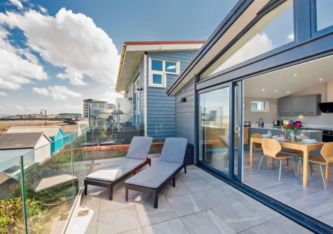 The patio & outdoor sitting area at Westward Home!, Westward Ho!