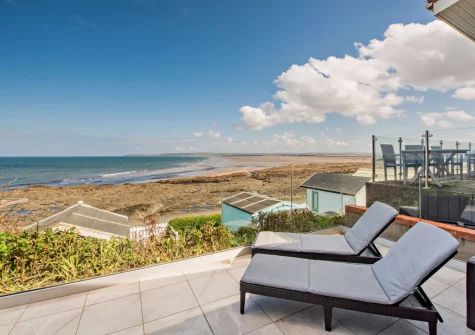 The patio & outdoor sitting area at Westward Home!, Westward Ho!