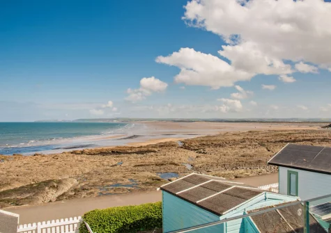 The sea & beach view from the patio & outdoor sitting area at Westward Home!, Westward Ho!